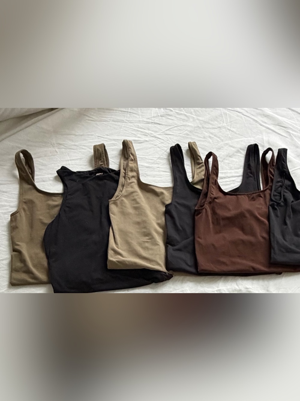 6 SKIMS Bodysuits (XS/S)